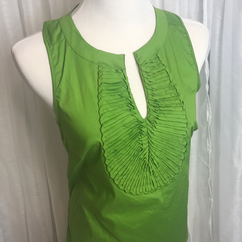 Green eraser back blouse
